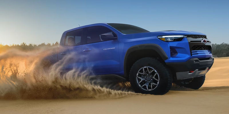 2026 Chevrolet Colorado driving on Eureka IL roads demonstrating powerful 2.7L TurboMax engine and towing capability