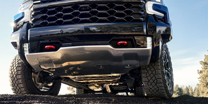 Detailed view of the hooks under the front grille of the 2026 Chevrolet Silverado 1500 in Eureka, IL, designed for added utility and off-road capability.